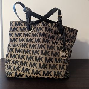 Michael Kors Brown and Black Purse with MK Medallion Accent